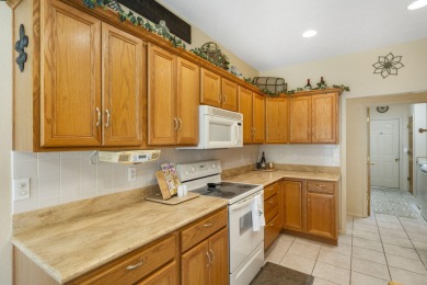 Nestled within the prestigious, gated, golf community of on Ledgestone Country Club and Golf Course in Missouri - for sale on GolfHomes.com, golf home, golf lot