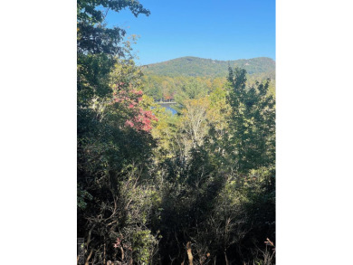 This 8.76-acre tract is a one-of-a-kind opportunity to purchase on Lake Toxaway Country Club in North Carolina - for sale on GolfHomes.com, golf home, golf lot