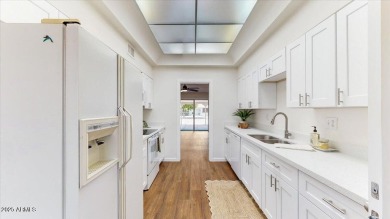 Beautifully renovated home on an excellent interior lot.  Inside on Sun City Lakes West and East in Arizona - for sale on GolfHomes.com, golf home, golf lot