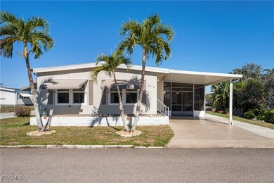 Beautifully remodeled, fully furnished manufactured home in a on Riverbend Golf and Country Club in Florida - for sale on GolfHomes.com, golf home, golf lot