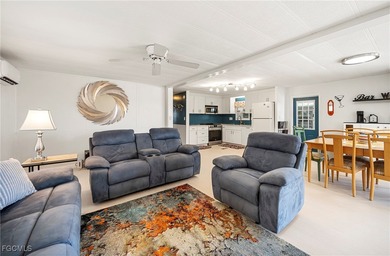 Beautifully remodeled, fully furnished manufactured home in a on Riverbend Golf and Country Club in Florida - for sale on GolfHomes.com, golf home, golf lot