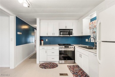 Beautifully remodeled, fully furnished manufactured home in a on Riverbend Golf and Country Club in Florida - for sale on GolfHomes.com, golf home, golf lot