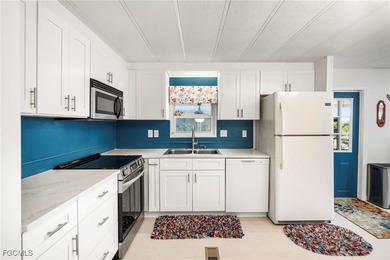 Beautifully remodeled, fully furnished manufactured home in a on Riverbend Golf and Country Club in Florida - for sale on GolfHomes.com, golf home, golf lot