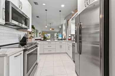 Welcome to this charming lakefront home located in the desirable on  in Florida - for sale on GolfHomes.com, golf home, golf lot