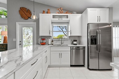 Welcome to this charming lakefront home located in the desirable on  in Florida - for sale on GolfHomes.com, golf home, golf lot