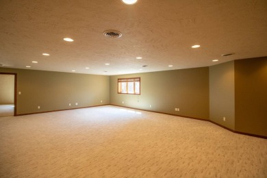 This stunning home in Rock Valley offers an unbeatable on Rock Valley Golf Course in Iowa - for sale on GolfHomes.com, golf home, golf lot
