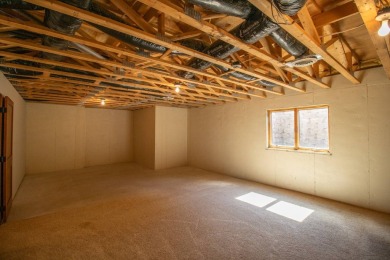 This stunning home in Rock Valley offers an unbeatable on Rock Valley Golf Course in Iowa - for sale on GolfHomes.com, golf home, golf lot