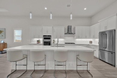 Located in the premier gated golf community of Tesoro Club, this on The Tesoro Golf Course and Club in Florida - for sale on GolfHomes.com, golf home, golf lot