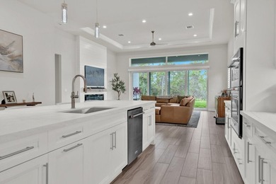 Located in the premier gated golf community of Tesoro Club, this on The Tesoro Golf Course and Club in Florida - for sale on GolfHomes.com, golf home, golf lot