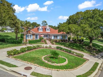 Experience refined living in this exquisitely updated residence on Harbor Hills Country Club in Florida - for sale on GolfHomes.com, golf home, golf lot