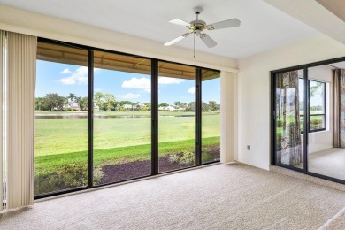 Spectacular lake and lush double fairway views from this 1st on Pine Tree Golf Club in Florida - for sale on GolfHomes.com, golf home, golf lot