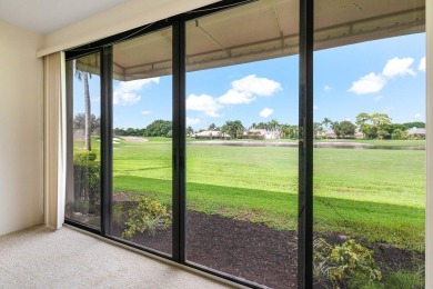 Spectacular lake and lush double fairway views from this 1st on Pine Tree Golf Club in Florida - for sale on GolfHomes.com, golf home, golf lot