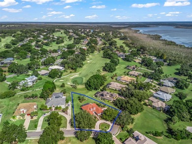 Experience refined living in this exquisitely updated residence on Harbor Hills Country Club in Florida - for sale on GolfHomes.com, golf home, golf lot