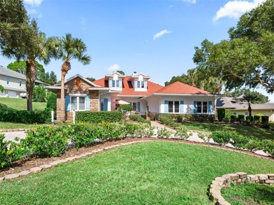 Experience refined living in this exquisitely updated residence on Harbor Hills Country Club in Florida - for sale on GolfHomes.com, golf home, golf lot