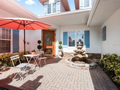 Experience refined living in this exquisitely updated residence on Harbor Hills Country Club in Florida - for sale on GolfHomes.com, golf home, golf lot