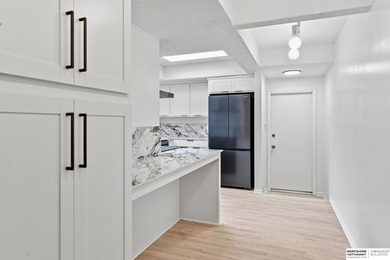 Katie McCabe, M: , Katie.mccabe,   - Maintenance-free living on Oak Hills Country Club in Nebraska - for sale on GolfHomes.com, golf home, golf lot