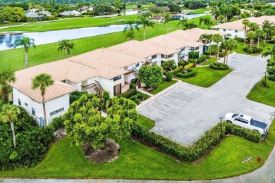 Spectacular lake and lush double fairway views from this 1st on Pine Tree Golf Club in Florida - for sale on GolfHomes.com, golf home, golf lot