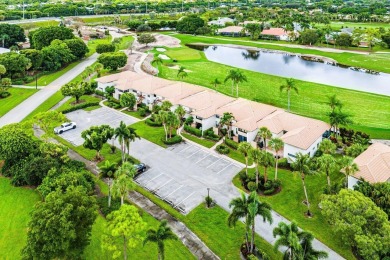 Spectacular lake and lush double fairway views from this 1st on Pine Tree Golf Club in Florida - for sale on GolfHomes.com, golf home, golf lot