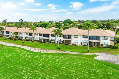 Spectacular lake and lush double fairway views from this 1st on Pine Tree Golf Club in Florida - for sale on GolfHomes.com, golf home, golf lot