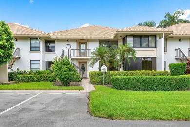 Spectacular lake and lush double fairway views from this 1st on Pine Tree Golf Club in Florida - for sale on GolfHomes.com, golf home, golf lot