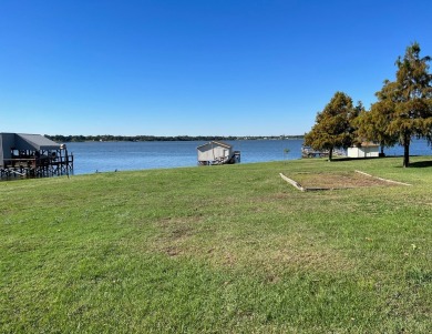 Waterfront Retreat on Lake Fork Golf Club - Rains County in Texas - for sale on GolfHomes.com, golf home, golf lot