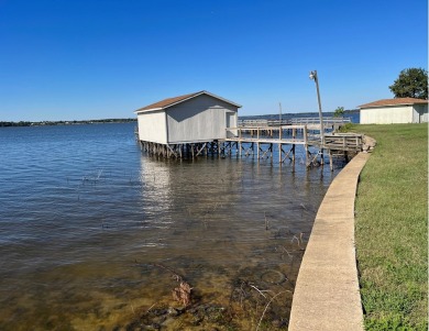 Waterfront Retreat on Lake Fork Golf Club - Rains County in Texas - for sale on GolfHomes.com, golf home, golf lot