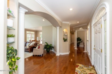 Experience the pinnacle of lakefront living in this immaculate on Beacon Ridge Golf and Country Club in North Carolina - for sale on GolfHomes.com, golf home, golf lot