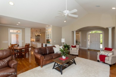 Experience the pinnacle of lakefront living in this immaculate on Beacon Ridge Golf and Country Club in North Carolina - for sale on GolfHomes.com, golf home, golf lot
