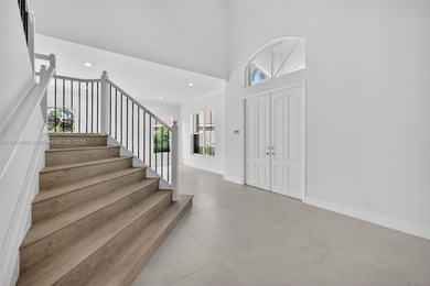 Fully renovated luxury home in the prestigious gated community on Weston Hills Country Club in Florida - for sale on GolfHomes.com, golf home, golf lot