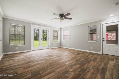 Welcome to your dream home! This beautifully renovated 5-bedroom on Mississippi National Golf Course in Mississippi - for sale on GolfHomes.com, golf home, golf lot
