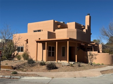 This charming Tierra Contenta home is just a stone's throw away on Santa Fe Country Club in New Mexico - for sale on GolfHomes.com, golf home, golf lot