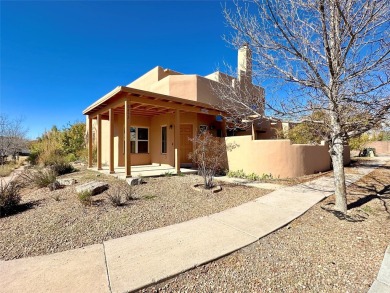 This charming Tierra Contenta home is just a stone's throw away on Santa Fe Country Club in New Mexico - for sale on GolfHomes.com, golf home, golf lot