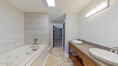 Welcome to your dream home! This beautifully renovated 5-bedroom on Mississippi National Golf Course in Mississippi - for sale on GolfHomes.com, golf home, golf lot