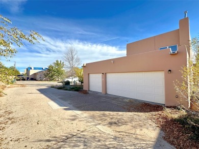 This charming Tierra Contenta home is just a stone's throw away on Santa Fe Country Club in New Mexico - for sale on GolfHomes.com, golf home, golf lot