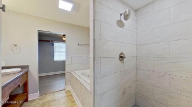 Welcome to your dream home! This beautifully renovated 5-bedroom on Mississippi National Golf Course in Mississippi - for sale on GolfHomes.com, golf home, golf lot