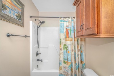 This spacious 3 Bedroom 2 Bath raised beach house is just a very on Prestwick Country Club in South Carolina - for sale on GolfHomes.com, golf home, golf lot