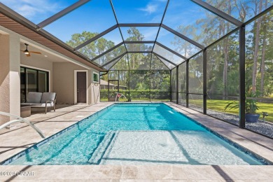 Welcome to 13 Elder Drive, Palm Coast - A Modern Masterpiece in on The Grand Club Cypress Course in Florida - for sale on GolfHomes.com, golf home, golf lot