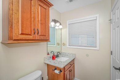 This spacious 3 Bedroom 2 Bath raised beach house is just a very on Prestwick Country Club in South Carolina - for sale on GolfHomes.com, golf home, golf lot