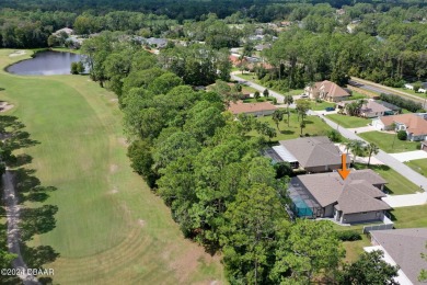 Welcome to 13 Elder Drive, Palm Coast - A Modern Masterpiece in on The Grand Club Cypress Course in Florida - for sale on GolfHomes.com, golf home, golf lot