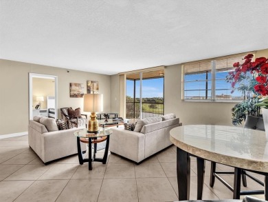 Experience elevated living in this beautifully updated 2-bed on  in Florida - for sale on GolfHomes.com, golf home, golf lot
