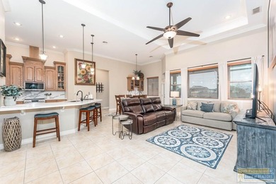 Experience refined lakefront living in this beautifully on South Padre Island Golf Club in Texas - for sale on GolfHomes.com, golf home, golf lot