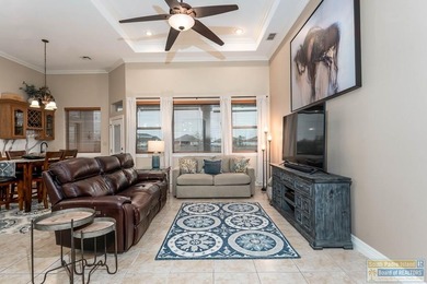 Experience refined lakefront living in this beautifully on South Padre Island Golf Club in Texas - for sale on GolfHomes.com, golf home, golf lot