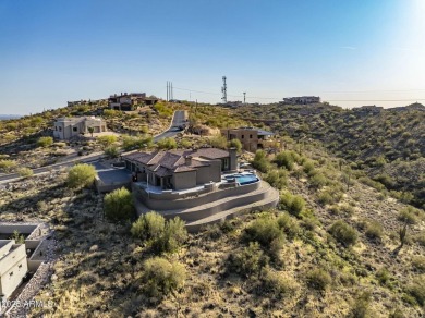 Perched on 2.3 acres in the exclusive gated community of on Eagle Mountain Golf Club in Arizona - for sale on GolfHomes.com, golf home, golf lot