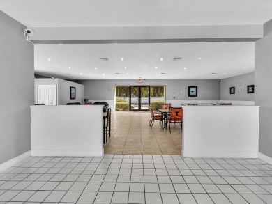 Experience elevated living in this beautifully updated 2-bed on  in Florida - for sale on GolfHomes.com, golf home, golf lot