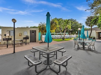 Experience elevated living in this beautifully updated 2-bed on  in Florida - for sale on GolfHomes.com, golf home, golf lot