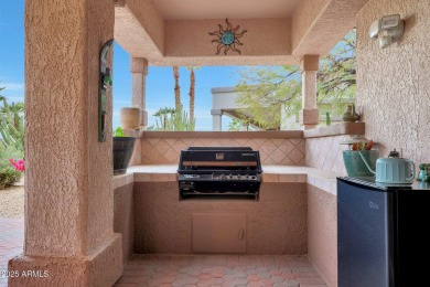 Discover a Slice of Paradise in The Grand!

This beautifully on Desert Springs Golf Course in Arizona - for sale on GolfHomes.com, golf home, golf lot