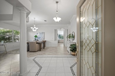 The great room beckons with a view overlooking a 12' x 35' on Grand Haven Golf Club in Florida - for sale on GolfHomes.com, golf home, golf lot