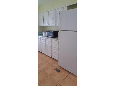 Double wide manufactured home with separate shed. Financing on Spanish Lakes I in Florida - for sale on GolfHomes.com, golf home, golf lot