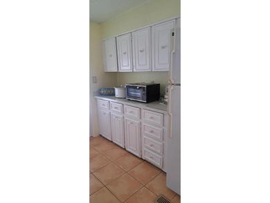 Double wide manufactured home with separate shed. Financing on Spanish Lakes I in Florida - for sale on GolfHomes.com, golf home, golf lot