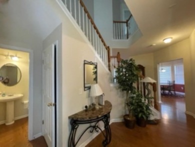 Beautiful Charleston style home w/balcony off second level.Home on River Falls Plantation in South Carolina - for sale on GolfHomes.com, golf home, golf lot